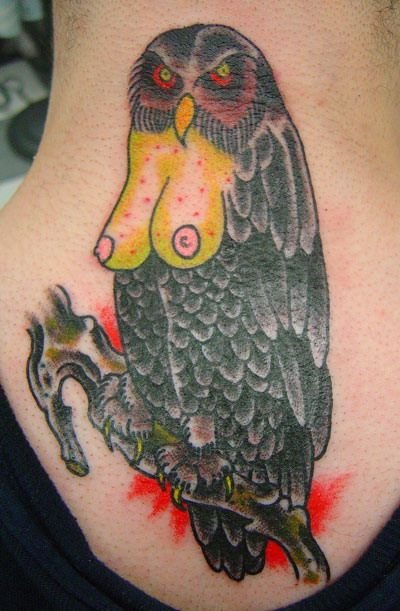 terrible-tattoo-awards-2013-owl-with-boobs.jpg